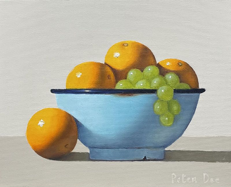 View Oranges and Grapes in Turquoise Bowl